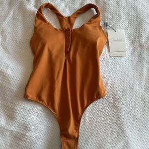 Bombshell sportswear bodysuit
